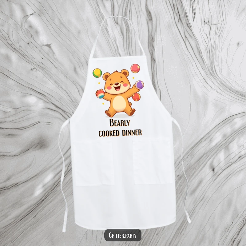 Funny apron with an excited bear cub juggling bright, colorful balls with a wide smile, ideal for kitchen fun.