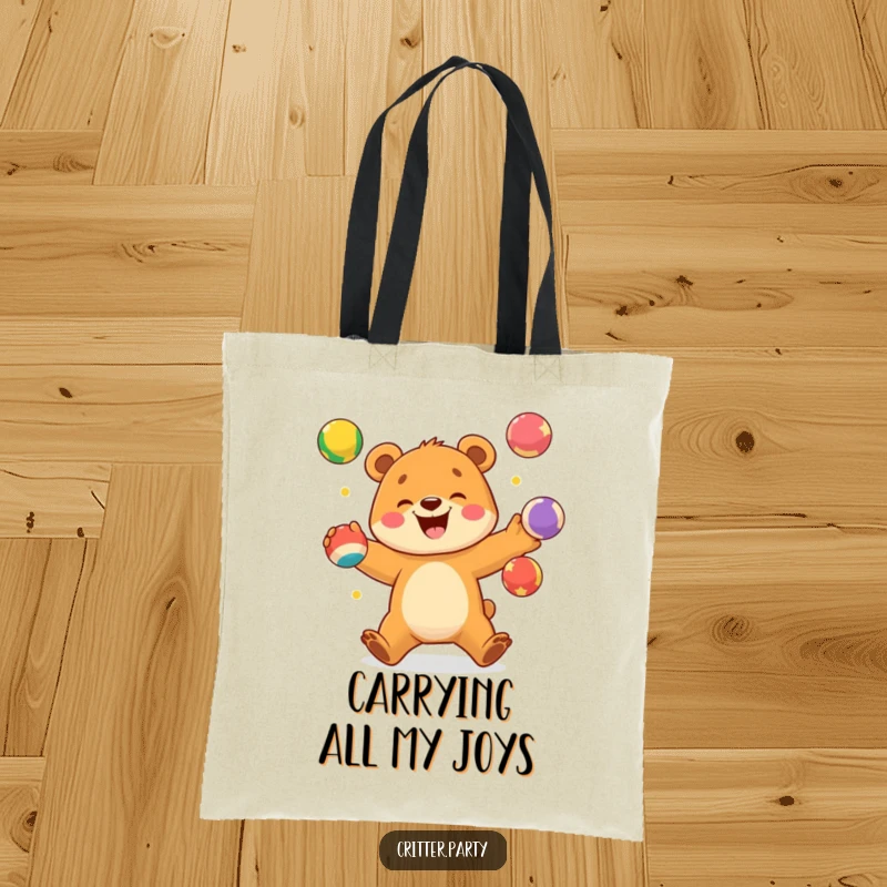 Funny tote bag featuring an excited bear cub juggling bright, colorful balls with a wide, happy smile.