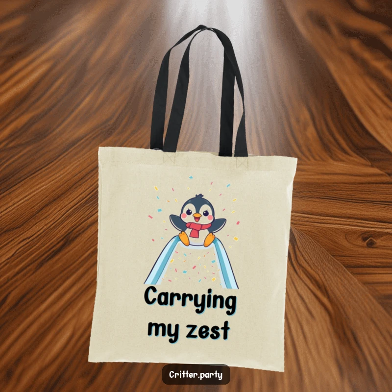 Funny canvas tote bag with a delighted penguin sliding down a confetti-covered slide, perfect for carrying fun and essentials.