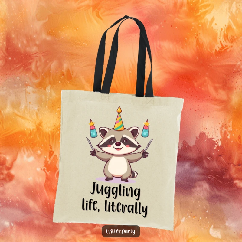 Funny tote bag featuring a giggling raccoon actively juggling shiny party horns, ideal for carrying essentials with a dose of humor.